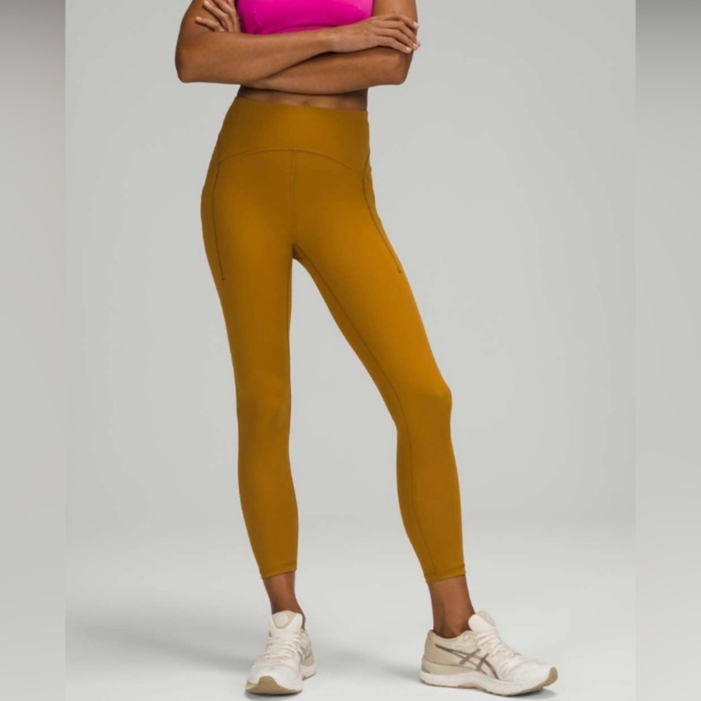 Lululemon power thru high rise tight 25” size 6 Gold Spice